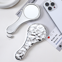 Miroir de maquillage de bureau minimaliste, pliable, portable, design rond compact avec cadre en plastique, poignée confortable, adapté aux étudiants