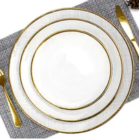 Assiettes en verre de luxe minimalistes de haute qualité, assiettes de service rondes blanches avec bord doré pour mariage