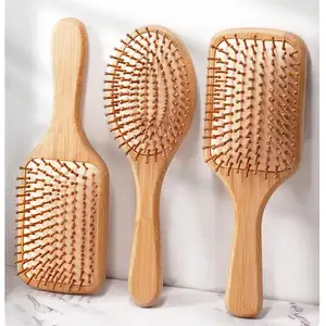 2023 caliente pelo de bambú paleta de bambú cepillo de pelo masaje del cuero cabelludo paleta desenredar peines de madera Natural