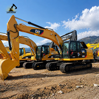 Excavatrice sur chenilles hydraulique d'occasion CAT 320D 320D2L 320D2 de 20 tonnes pour travaux de terrassement et de construction