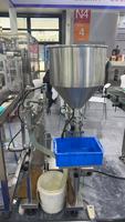 Machine de remplissage semi-automatique pour liquides et pâtes, en acier inoxydable 316, anti-goutte, remplissage précis, norme GMP