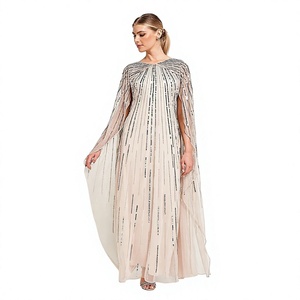 Vestido de noche de poliéster 100% antiarrugas con lentejuelas color champán, cuello barco, manga larga, silueta ajustada, largo hasta el suelo y cintura imperio. - Product Image 1