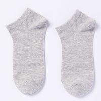 Chaussettes décontractées pour hommes, mi-mollet, unies, respirantes, antibactériennes, antidérapantes, pour l'été et l'usage quotidien, technique de tissage jetable