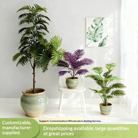 Bouquet de plantes artificielles en PVC souple de style nordique pour la décoration du salon, comprenant des palmiers Areca, des plantes du paradis et des bananiers du voyageur en pot.