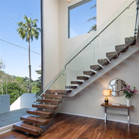 Kit complet d'escalier flottant moderne à monopoutre pour intérieur avec marches en bois massif et balustrade en verre