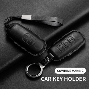 ปลอกกุญแจหนังพรีเมียมพร้อมพวงกุญแจ<span class=keywords><strong>ส</strong></span>ำหรับ Mazda 3 CX5 CX30 ป้องกันเต็มรูปแบบ ใช้ได้กับรถยนต์นำเข้า ขายส่งจากโรงงาน - Product Image 1
