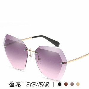 แว่นตา แว่นกันแดดไร้กรอบ โลหะสีทอง UV400 ผู้หญิง แฟชั่น เลนส์สไตล์โอเชี่ยน - Product Image 1
