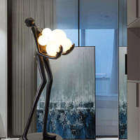 Lampe sur pied en résine noire pour intérieur, sculpture d'homme, art créatif, sculpture humaine, lampe d'angle pour salon, villa, escalier