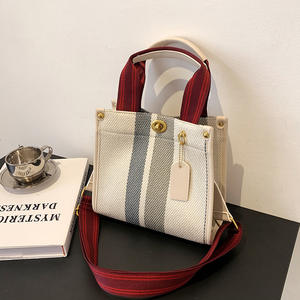 Vente en gros de fourre-tout sacs pour femmes 2025 2026 nouvelle toile rayée fourre-tout large bande femmes dames épaule sacs à bandoulière - Product Image 1