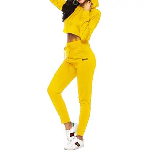 Commercio all'ingrosso OEM ultime donne di disegno sportivo jogging suit personalizzato logo di cotone poliestere giallo crop tute