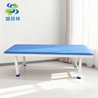 Table d'examen médical plate, surface antibactérienne, capacité de charge de 200 kg, conception robuste pour le diagnostic des patients en clinique et à l'hôpital