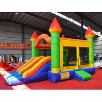 Château gonflable coloré KARRY KR12530 avec toboggan, panier de basket, aire de jeux pour enfants, fête d'anniversaire, événements en plein air