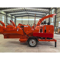 Broyeur de bois industriel mobile diesel facile à utiliser avec alimentation hydraulique, déchiqueteuse de feuilles d'arbres à vendre