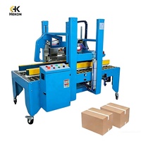 Scelleuse de cartons entièrement automatique HEKON avec détection adaptative de la taille et pliage du couvercle supérieur, machine à sceller les boîtes par ruban adhésif