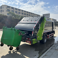 Camion à ordures à compression Shacman de 6 mètres cubes, camion à ordures compacteur de 6000 L pour la collecte et le transport des déchets