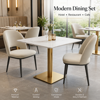 Ensemble de table à manger en marbre de luxe moderne avec base dorée et chaises rembourrées pour hôtel, restaurant, café, salle à manger