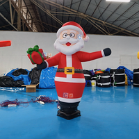 Père Noël Gonflable Dansant dans le Ciel avec Cadeau, Décoration Extérieure de Noël, Homme Agitant les Bras pour Promotion Commerciale des Fêtes
