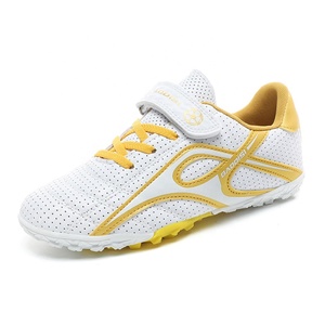 <span class=keywords><strong>Botas</strong></span> de fútbol de entrenamiento deportivo para niños de alta calidad al por mayor zapatillas de fútbol escolares resistentes y antideslizantes para niños deporte - Product Image 1