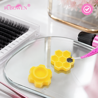 En gros Fubowen Anneau de colle jetable pour extensions de cils, nid d'abeille 7 trous, forme fleur de prunier, pour greffage