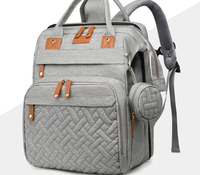 Sac à langer élégant pour femme, étui pour sucette, grand sac de rangement multifonction, matelas à langer, sangles de poussette, fermeture éclair, économiseur d'énergie