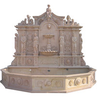 Fontaine murale en marbre naturel YouFine, tête de lion classique, décoration d'eau extérieure pour jardin avec sculptures de dauphins