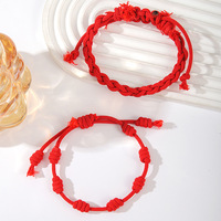 Ensemble de 2 bracelets de couple en cordon rouge porte-bonheur à 7 nœuds, faits à la main, péruviens, réglables