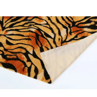 Vente chaude Tissu de canapé en velours personnalisé 100% polyester tricoté à motif animal imprimé tigre pour la tapisserie d'ameublement
