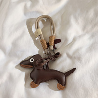 Porte-clés en cuir PU de luxe pour chien, avec impression UV, couleur personnalisée, breloque de sac et porte-clés de voiture, vente en gros