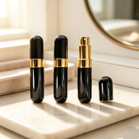 Flacon pulvérisateur de parfum portable en aluminium noir brillant à extrémités rondes de 10 ml, rechargeable