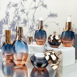 <span class=keywords><strong>Deluxe</strong></span> 30 50g 30 50 100 150ml Bouteilles cosmétiques en verre vides rondes bleu orange crème de soin de la peau emballée avec emballage de pompes - Product Image 1