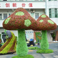 Grande sculpture de jardin en herbe artificielle, faite en Chine, avec cadre en fil de fer durable et plante verte de simulation