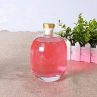 Bouteille en verre vide de 250 ml de haute qualité, ronde et givrée, avec bouchon, imprimée sérigraphiée, pour vin de prune verte et boissons