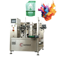 Machine d'emballage rotative pour sachets préformés de lessive liquide et de détergent, machine de remplissage de sachets à bec verseur