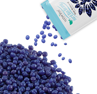 Sacs emballés de fèves de cire dure sans colophane OEM paillettes rose vert bleu forte élasticité sans allergie pour salon de beauté et épilation