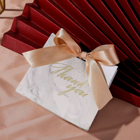 Vente en gros Sac cadeau de remerciement pliable Petite boîte en papier design à la mode Boîtes de faveur de mariage personnalisées, luxueuses et imprimées