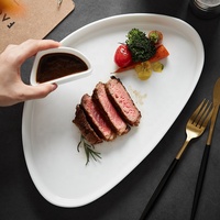 Ensemble de vaisselle de luxe écologique pour dîner de steak, assiettes en céramique blanches de forme irrégulière pour hôtels, restaurants et usage domestique