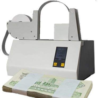 Machine de cerclage automatique de bureau pour billets de banque, avec ruban OPP, fournie par l'usine