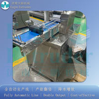 Machine de découpe rotative à vitesse élevée et à longueur fixe pour snacks soufflés / friandises pour animaux de compagnie