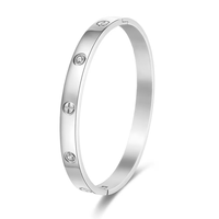 Bracelet jonc en acier inoxydable plaqué or 18 carats et argent, motif croix et cœur, anti-ternissement, par un fabricant de bijoux de mode