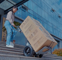 Chariot mobile en acier mobile d'escalier de camion d'escalade électrique brillant avec la nouvelle condition de batterie au Lithium pour les marchandises lourdes