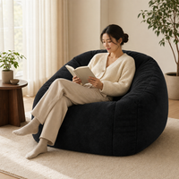 Fauteuil d'appoint sculptural en peluche courte compressée sous vide, design cuve, pour salon et coin lecture - Vente en gros