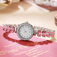 Montre en quartz écologique de style sirène colorée pour femmes, avec boîtier en alliage de zinc et design incrusté de diamants