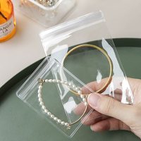Bolsa de joyería con cierre de cremallera transparente de PVC transparente, bolsa de embalaje autosellada con cremallera de plástico a prueba de polvo de tamaño pequeño para anillos y pendientes