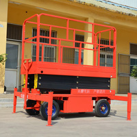 Plateforme de travail aérienne mobile hydraulique à ciseaux avec stabilisateurs pour la maintenance
