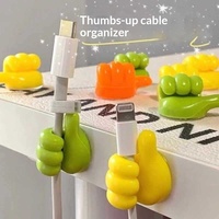Organisateur de câbles multifonctionnel en acrylique, clip adhésif en forme de pouce, fixation solide, mignon, sans perçage, gestionnaire de fils compact