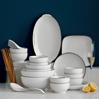 Ensemble de bols et d'assiettes en céramique et porcelaine, sans BPA, écologiques, résistants à la chaleur, durables, étanches, blancs avec bord noir, pour hôtel, restaurant, salle à manger