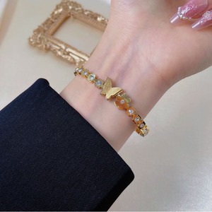 PVD 18K Gold Plated Titanium Stainless Steel Butterfly & Flower <b>Bangle</b> <b>Bracelet</b> with Spring Loaded Clasp for Women - Product Image 5