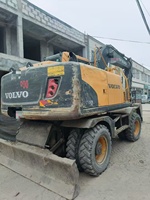 Pelle sur pneus d'occasion VOLVO EW145 à chenilles 15 tonnes, haute efficacité 0.55-0,93 m³, capacité du godet à vendre