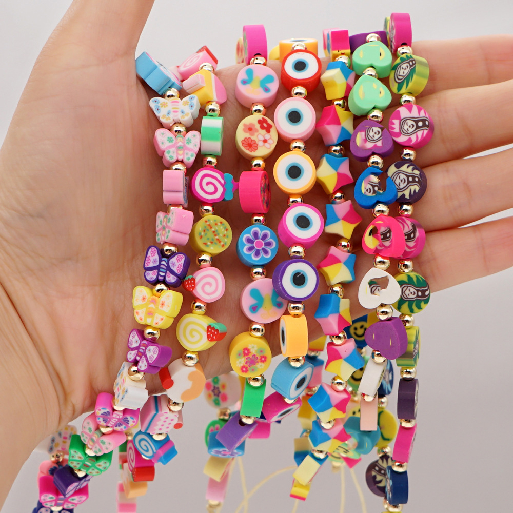 Dvacaman Boho Mobile Chain Pearl Colorful Beaded Anti-lost Phone Strap Charm Handmade Gold Soft Pottery Flower Wrist Phone Chain