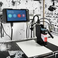 Machine industrielle automatique en ligne d'imprimante à jet d'encre TIJ petit caractère pour le codage de date pour l'impression de sacs de bouteille de carton de papier
